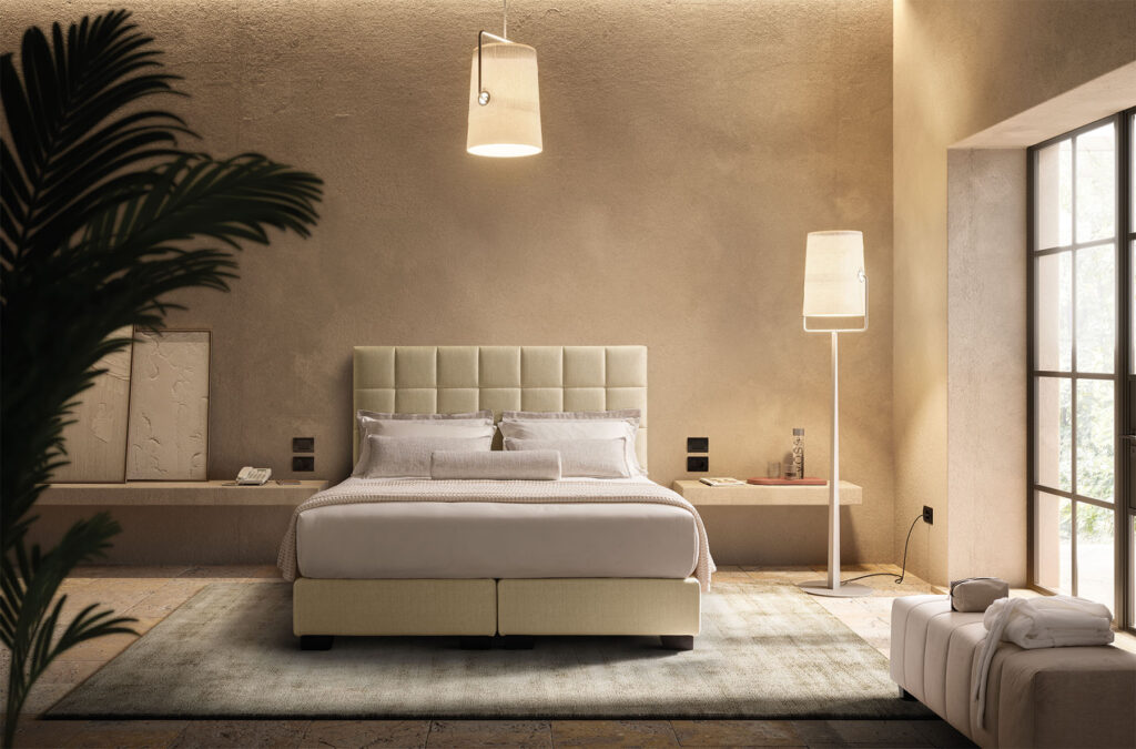 Letto della linea Dem Armonie del Sonno Contract in una camera d’albergo